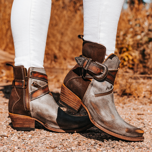 FREEBIRD women's Whip ice multi leather ankle bootie with western buckle and pointed snip toe