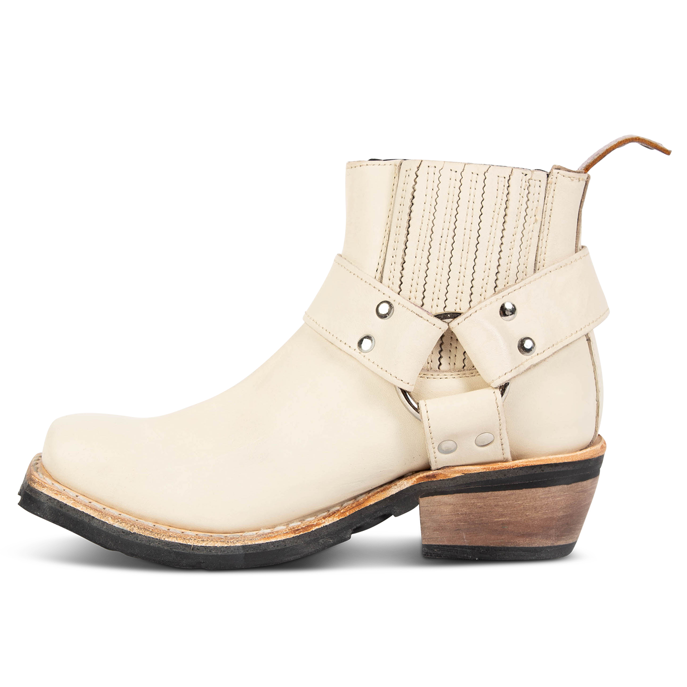 Inside view showing gore construction and leather ankle harness with silver hardware on FREEBIRD women's Whiskey beige ankle bootie