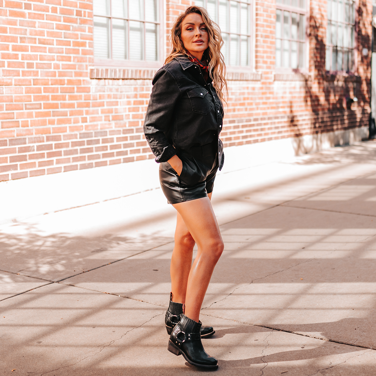 FREEBIRD women's Whiskey black tire tread gore detailing ankle harness ankle bootie lifestyle image
