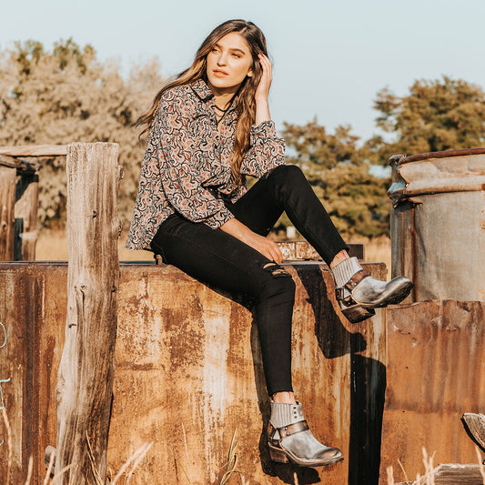 FREEBIRD women's Whiskey ice multi tire tread gore detailing ankle harness ankle bootie lifestyle image