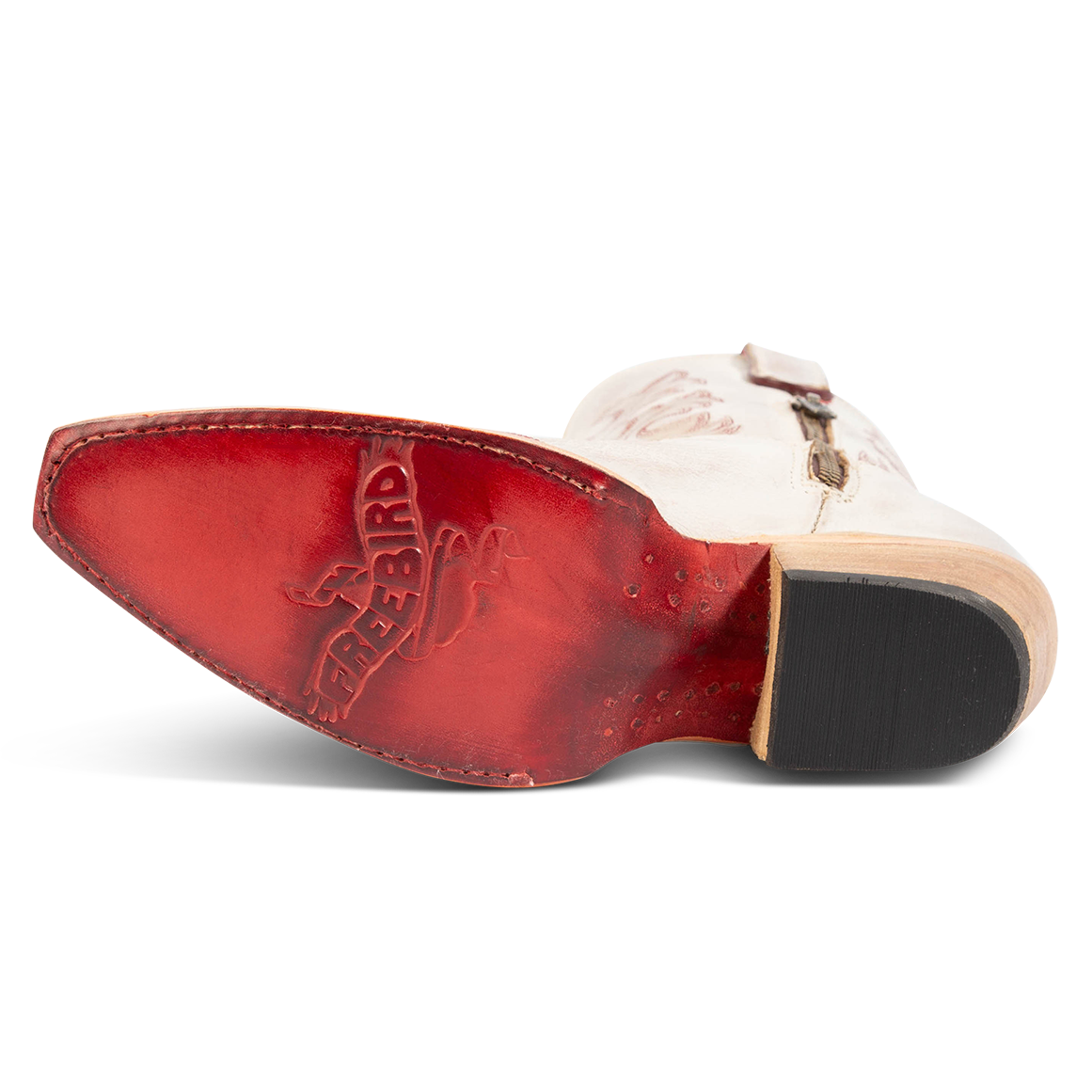 Red leather sole imprinted with FREEBIRD on women's Wilson beige leather western boot