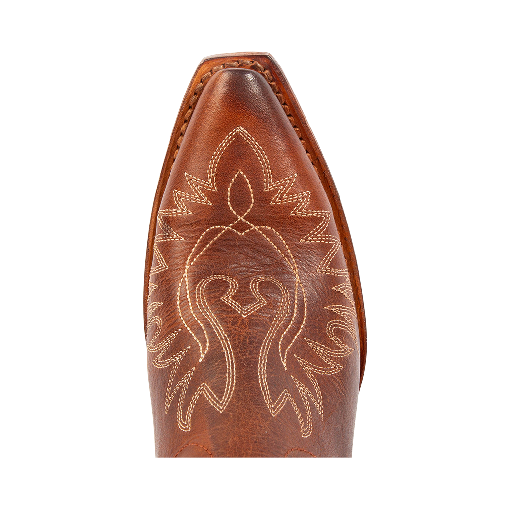 Top view showing snip toe construction and contrasting toe stitching on FREEBIRD women's Wilson Cognac leather western boot