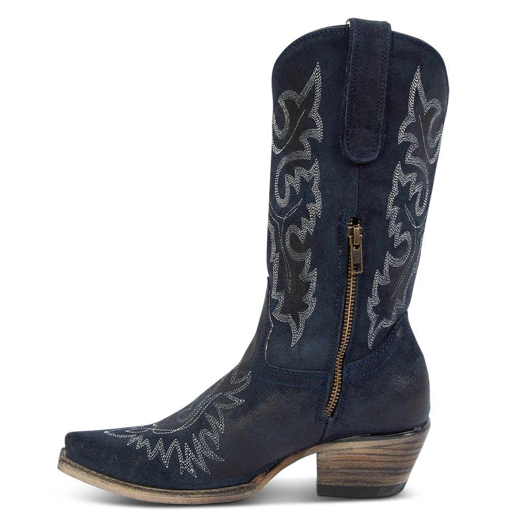 Side view showing snip toe construction, intricate shaft and toe stitching, and half zip closure on FREEBIRD women's Wilson navy Suede western boot