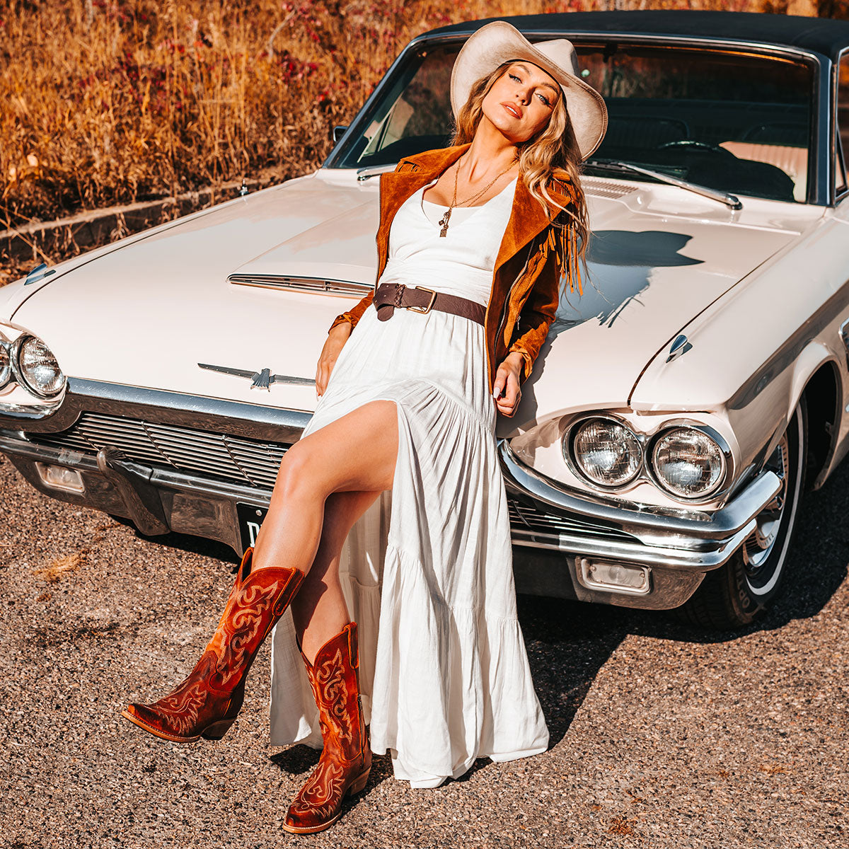 FREEBIRD women's Wilson rust suede western boot with snip toe construction, intricate shaft and toe stitching, and half zip closure lifestyle