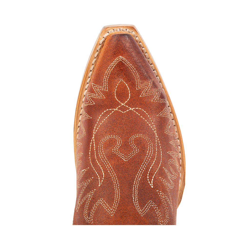 Top view showing snip toe construction and contrasting toe stitching on FREEBIRD women's Wilson rust suede western boot