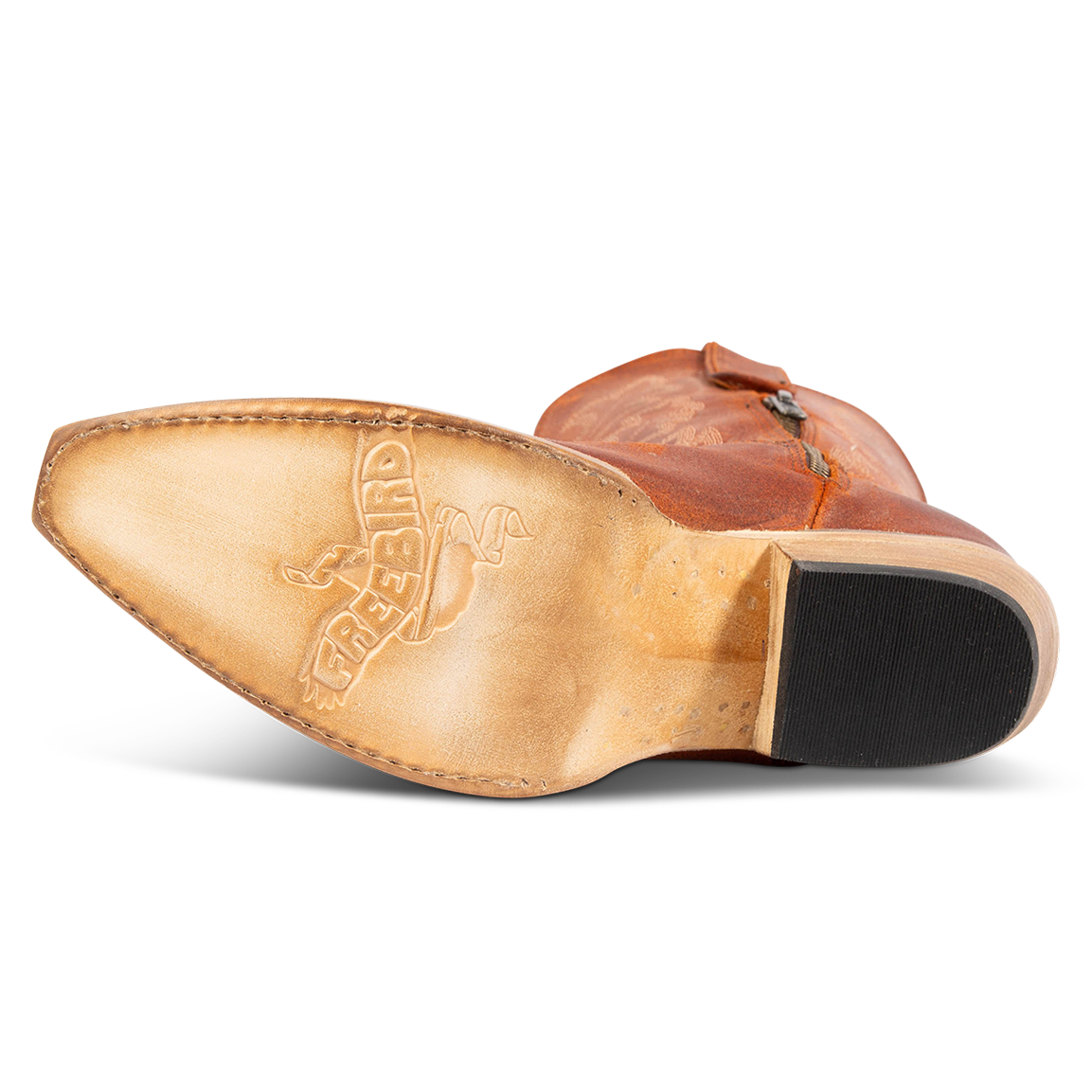 Leather sole imprinted with FREEBIRD on women's Wilson rust suede western boot