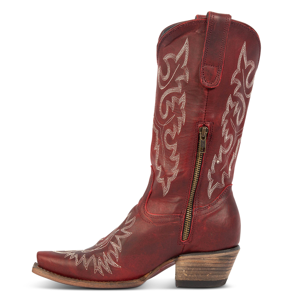Side view showing snip toe construction, intricate shaft and toe stitching, and half zip closure on FREEBIRD women's Wilson wine leather western boot
