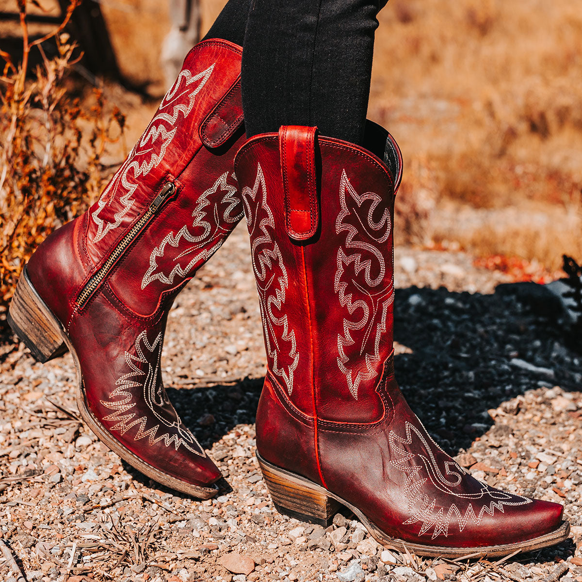 FREEBIRD women's Wilson wine leather western boot with snip toe construction, intricate shaft and toe stitching, and half zip closure