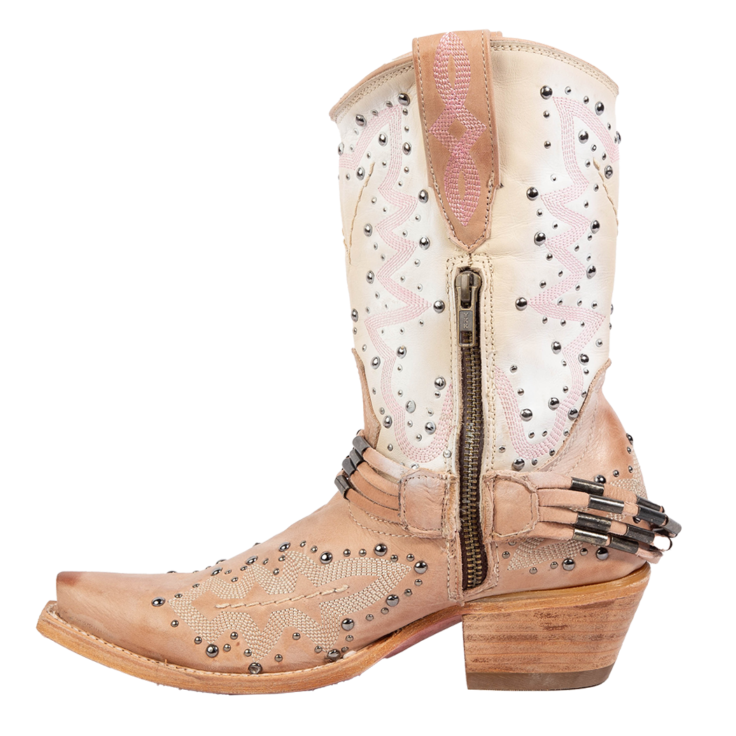 Side view showing leather pull tabs and a working brass half zip closure on FREEBIRD women's Wisteria blush boot