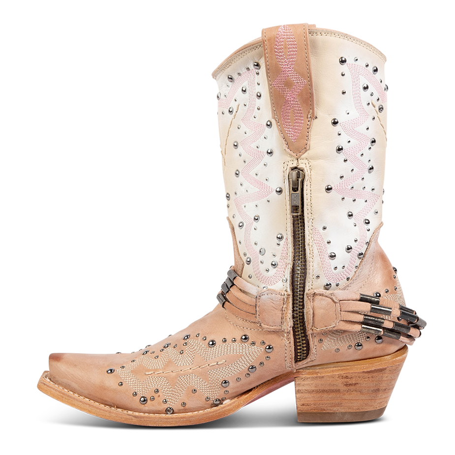 Side view showing leather pull tabs and a working brass half zip closure on FREEBIRD women's Wisteria blush boot