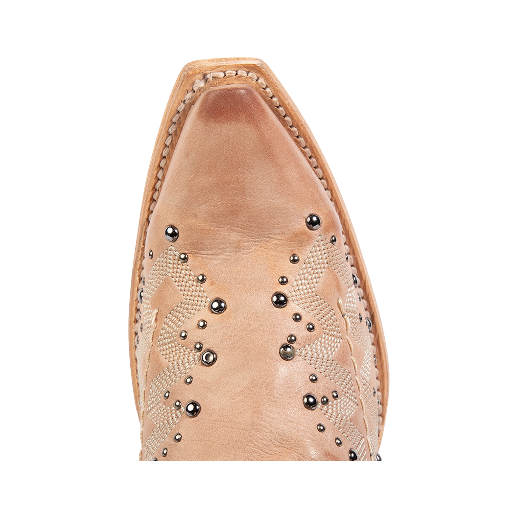 Top view showing snip toe construction with silver studs and western stitching on FREEBIRD women's Wisteria blush boot