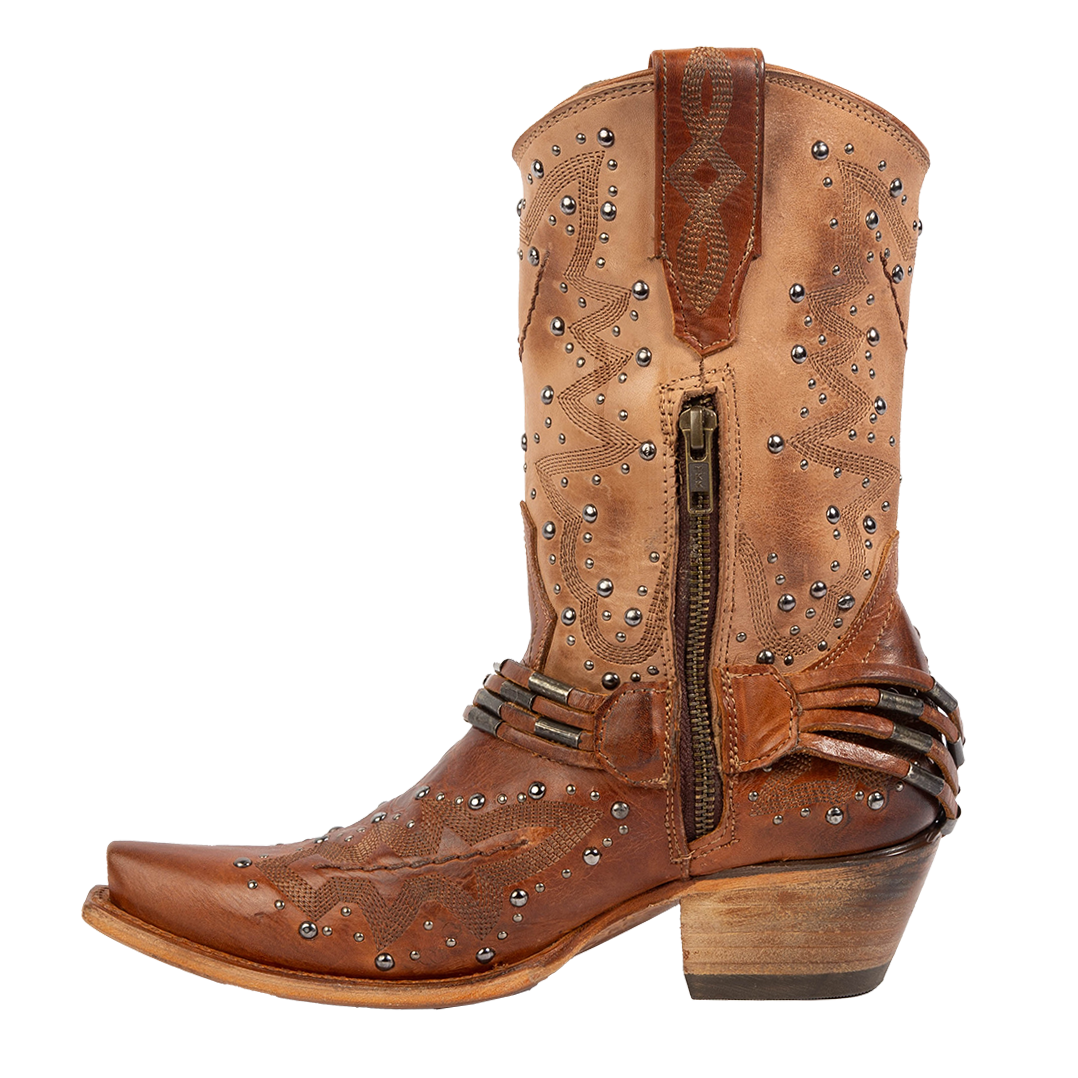 Side view showing leather pull tabs and a working brass half zip closure on FREEBIRD women's Wisteria tan boot