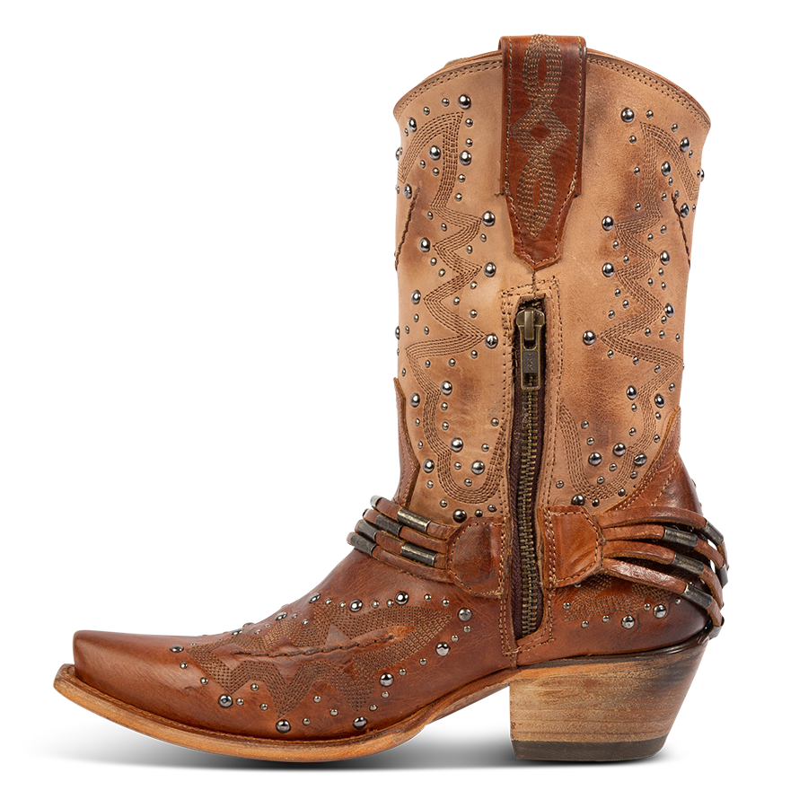Side view showing leather pull tabs and a working brass half zip closure on FREEBIRD women's Wisteria tan boot