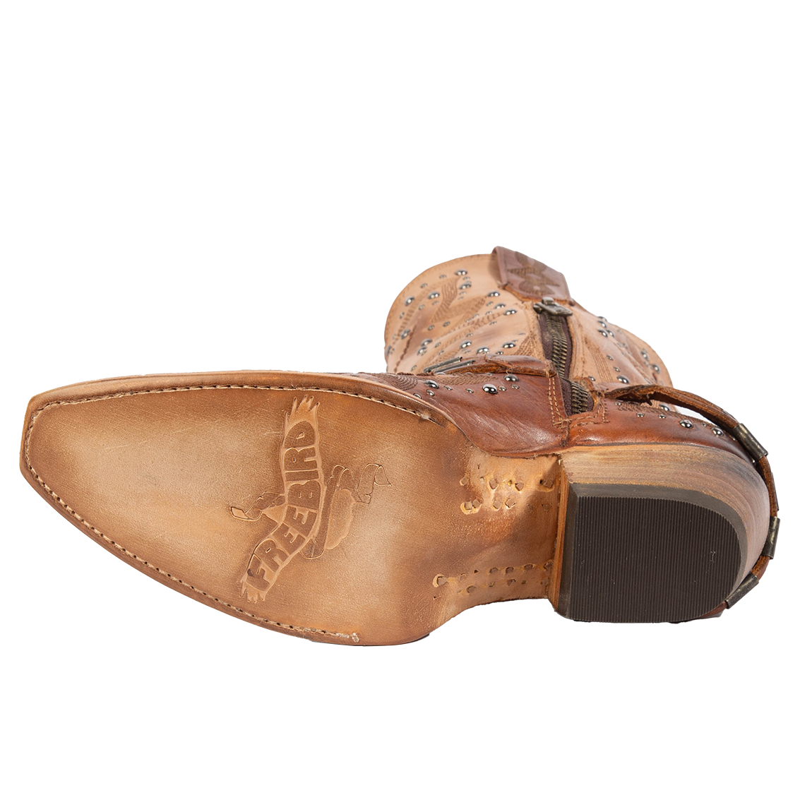 Leather sole imprinted with FREEBIRD on women's Wisteria tan boot