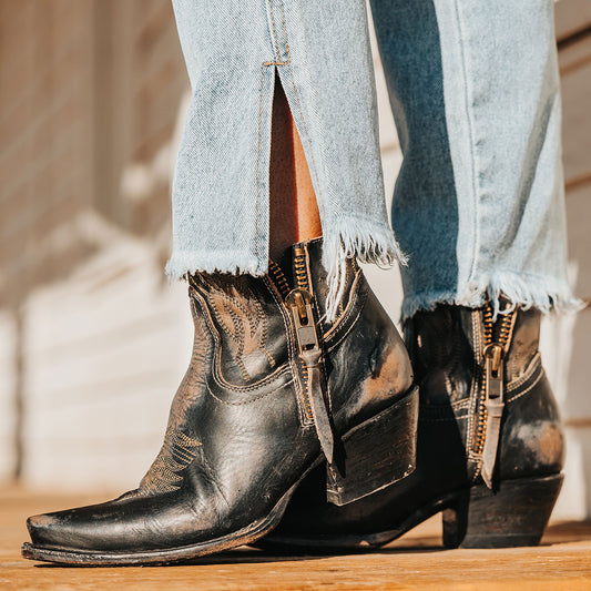FREEBIRD women's Wolfie black leather bootie with stitch detailing and snip toe construction