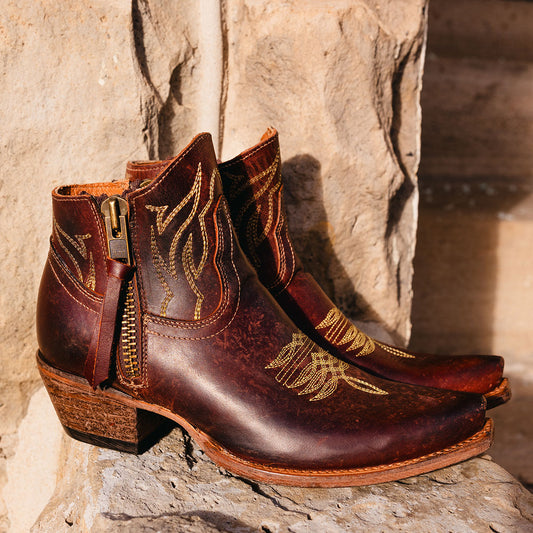 FREEBIRD women's Wolfie cognac leather bootie with stitch detailing and snip toe construction