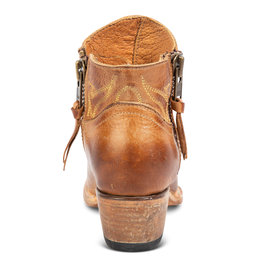 Back view of FREEBIRD women's Wolfie wheat leather bootie with stitch detailing and low slanted heel