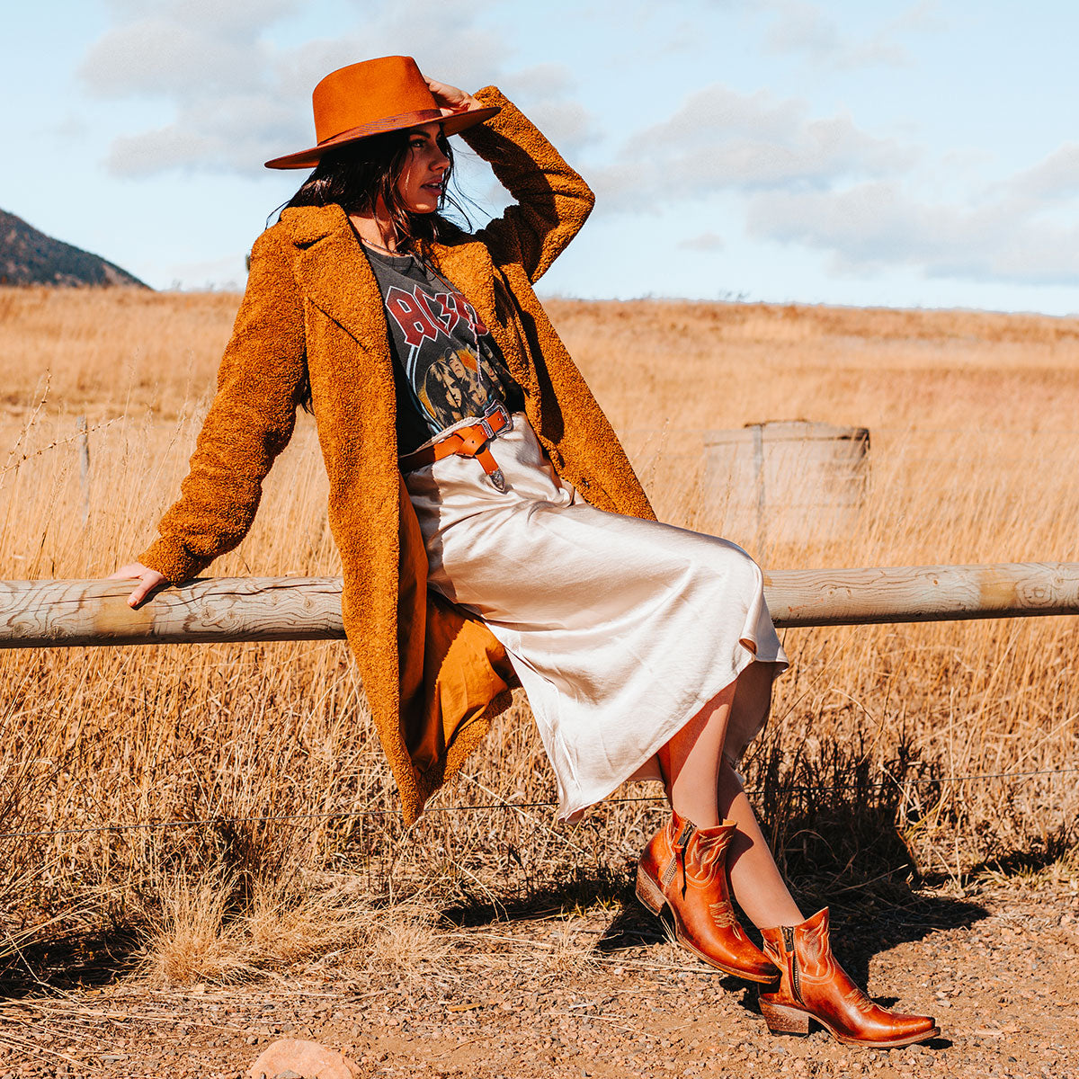 FREEBIRD women's Wolfie whiskey leather bootie with stitch detailing and snip toe construction lifestyle image