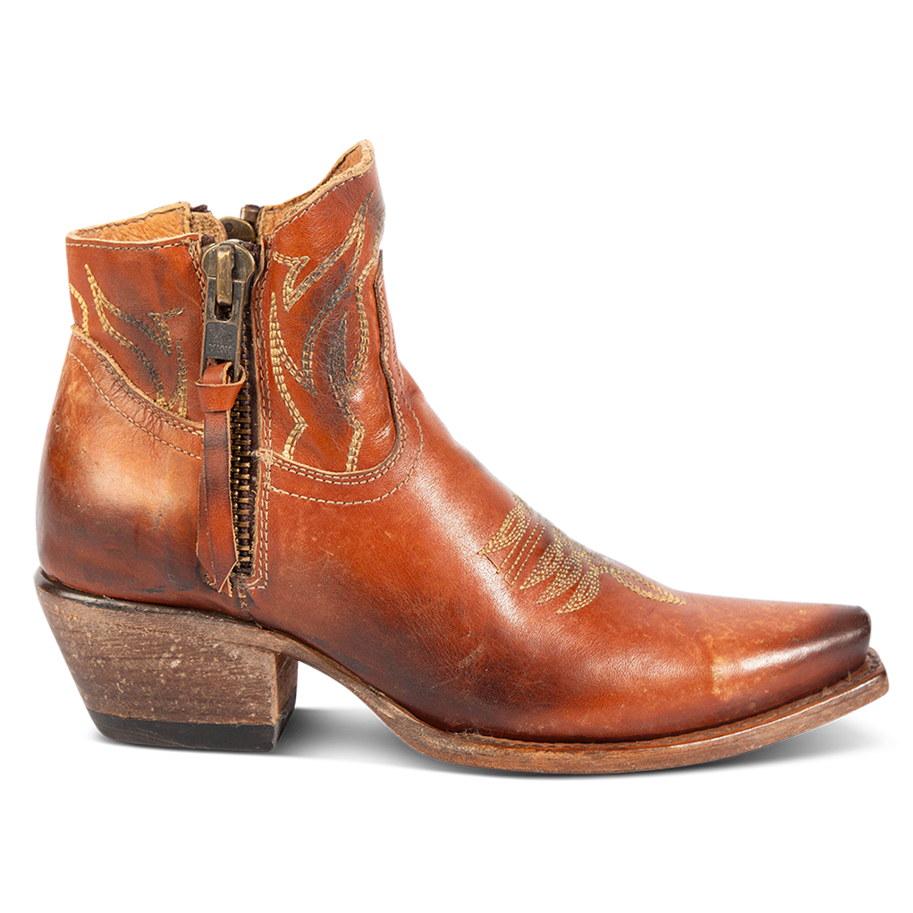 FREEBIRD women's Wolfie whiskey leather bootie with stitch detailing and snip toe construction