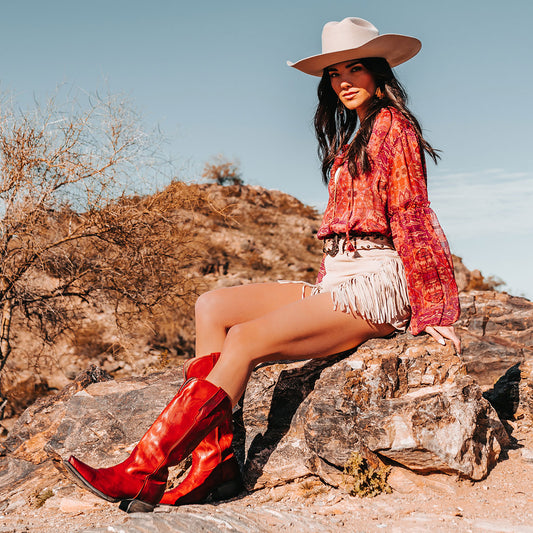 FREEBIRD women's Woodland red leather cowboy boot with stitch detailing and snip toe construction lifestyle image