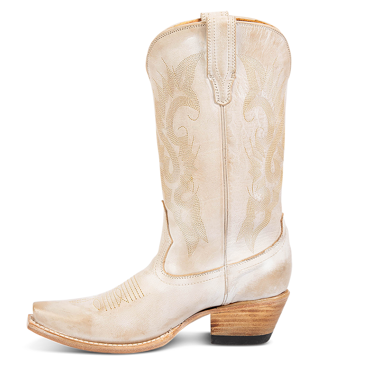 Side view showing FREEBIRD women's Woody beige leather boot with stitch detailing and snip toe construction