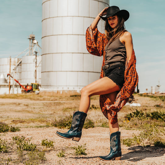 FREEBIRD women's Woody blue leather boot with stitch detailing and snip toe construction lifestyle image