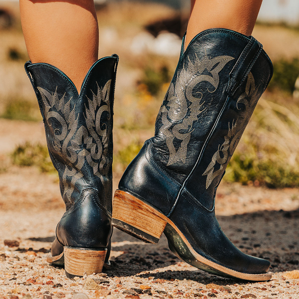 FREEBIRD women's Woody blue leather boot with stitch detailing and snip toe construction