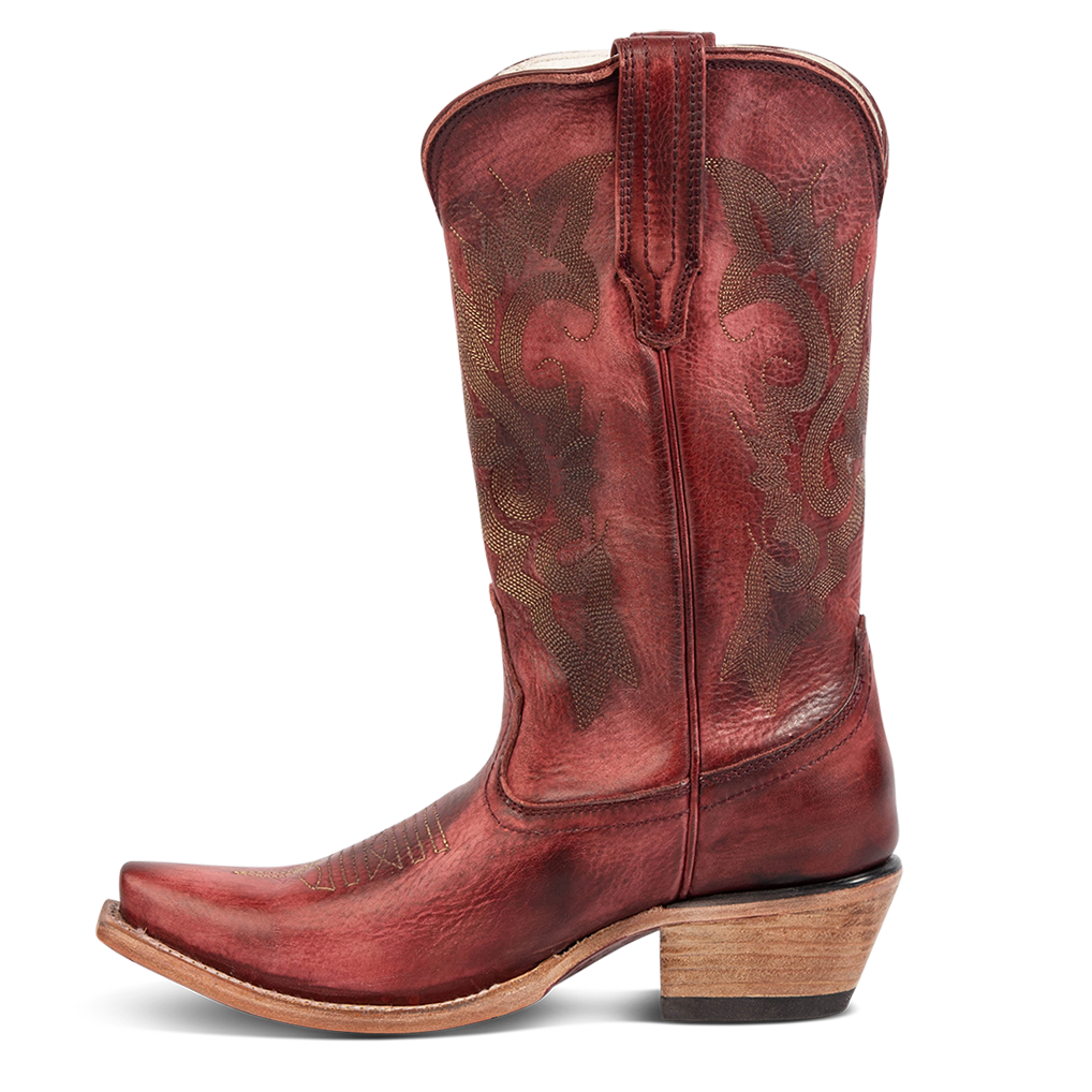 Side view showing FREEBIRD women's Woody wine leather boot with stitch detailing and snip toe construction