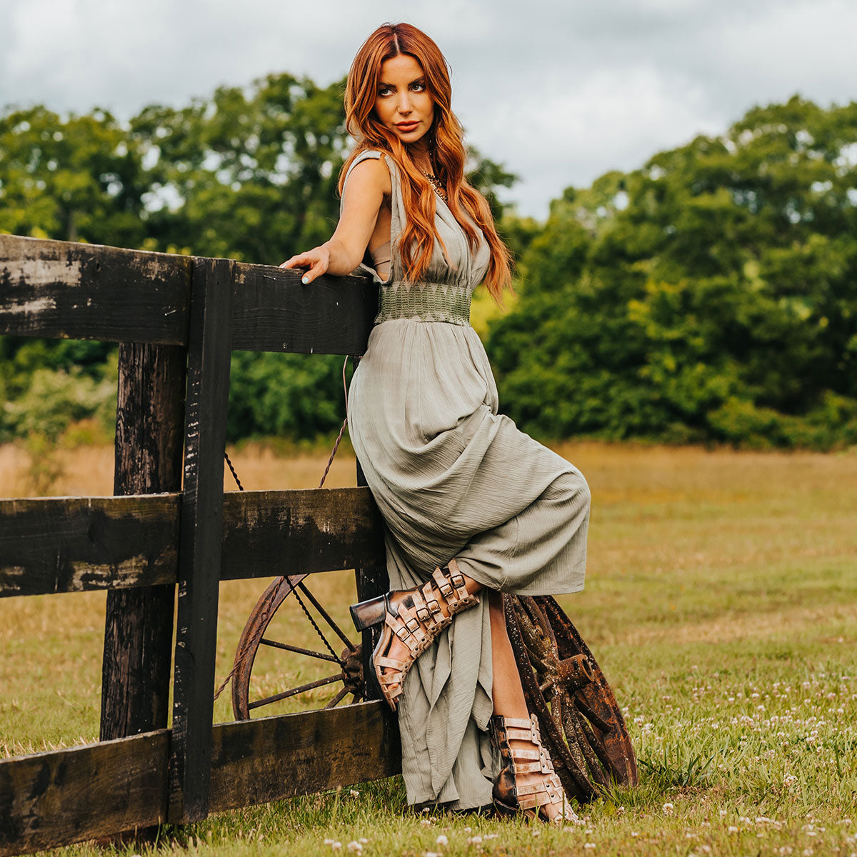 FREEBIRD women's Zeus Taupe Multi a strappy heeled sandal featuring adjustable buckles, leather, and stud detailing lifestyle image