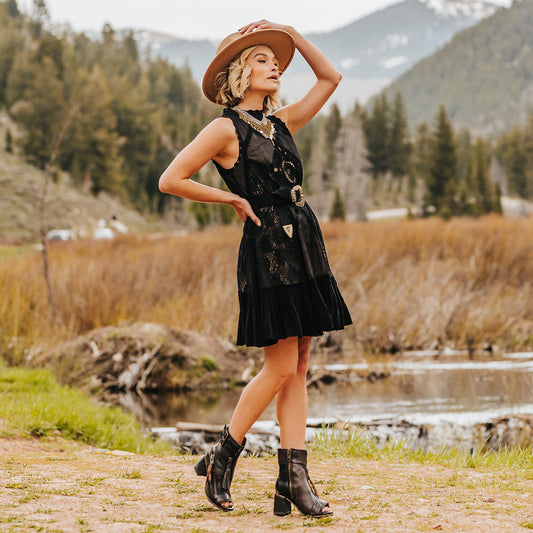 FREEBIRD women's Zombi black sandal with zip and buckle leather detailing and stacked heel lifestyle image