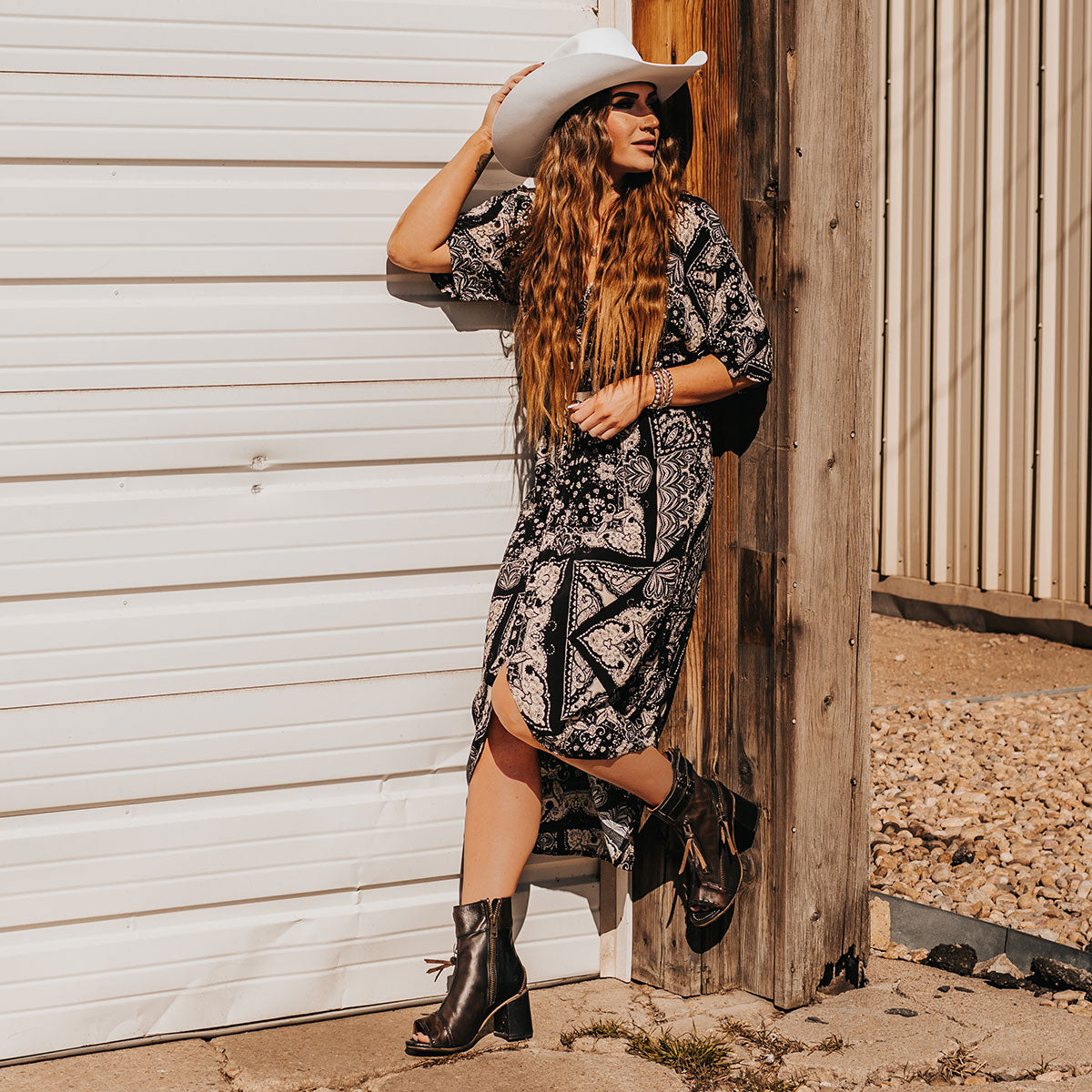 FREEBIRD women's Zombi black sandal with zip and buckle leather detailing and stacked heel lifestyle image