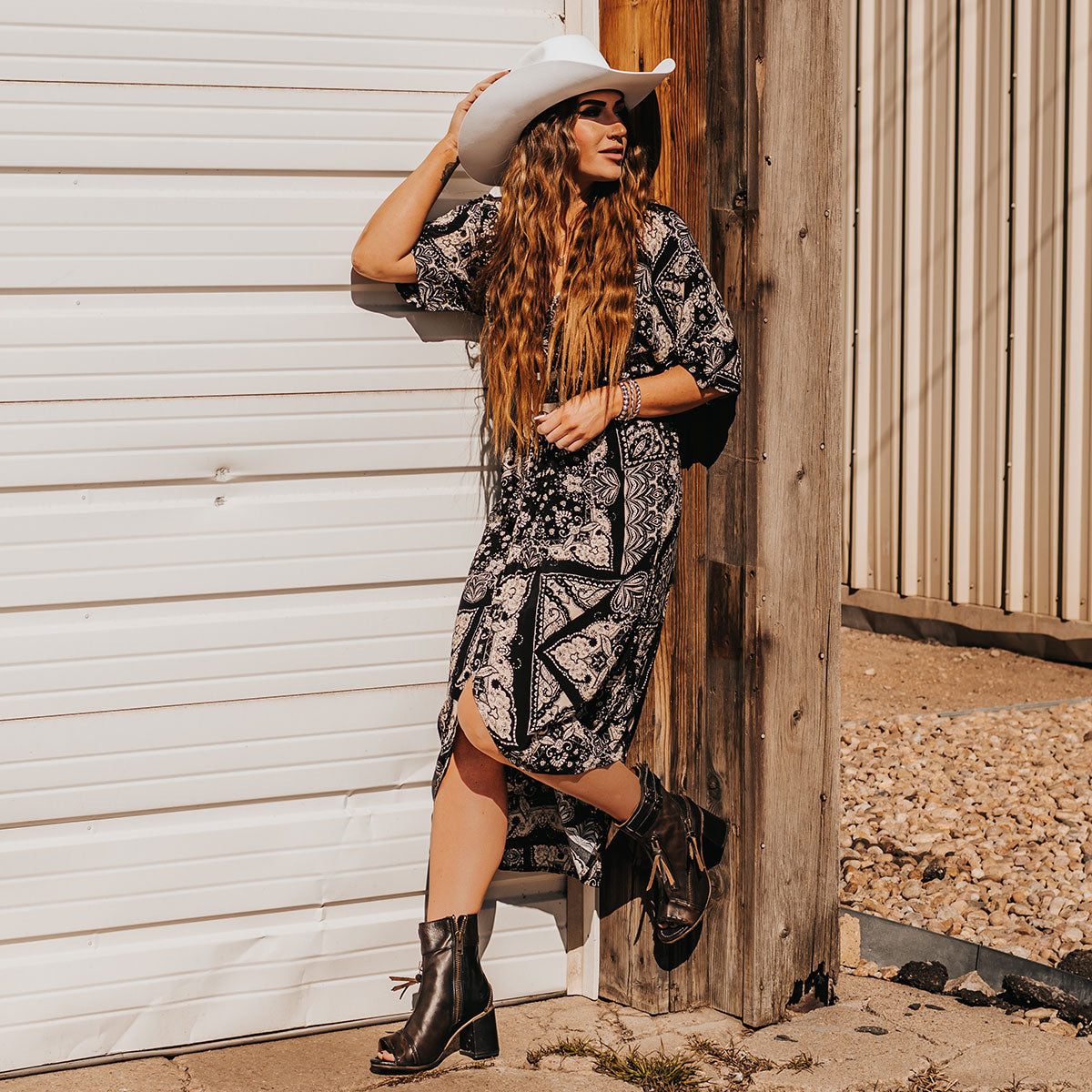 FREEBIRD women's Zombi black sandal with zip and buckle leather detailing and stacked heel lifestyle image