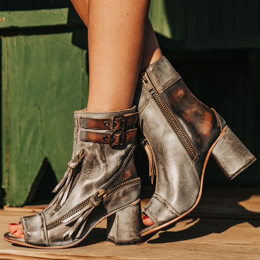 FREEBIRD women's Zombi ice sandal with zip and buckle leather detailing and stacked heel