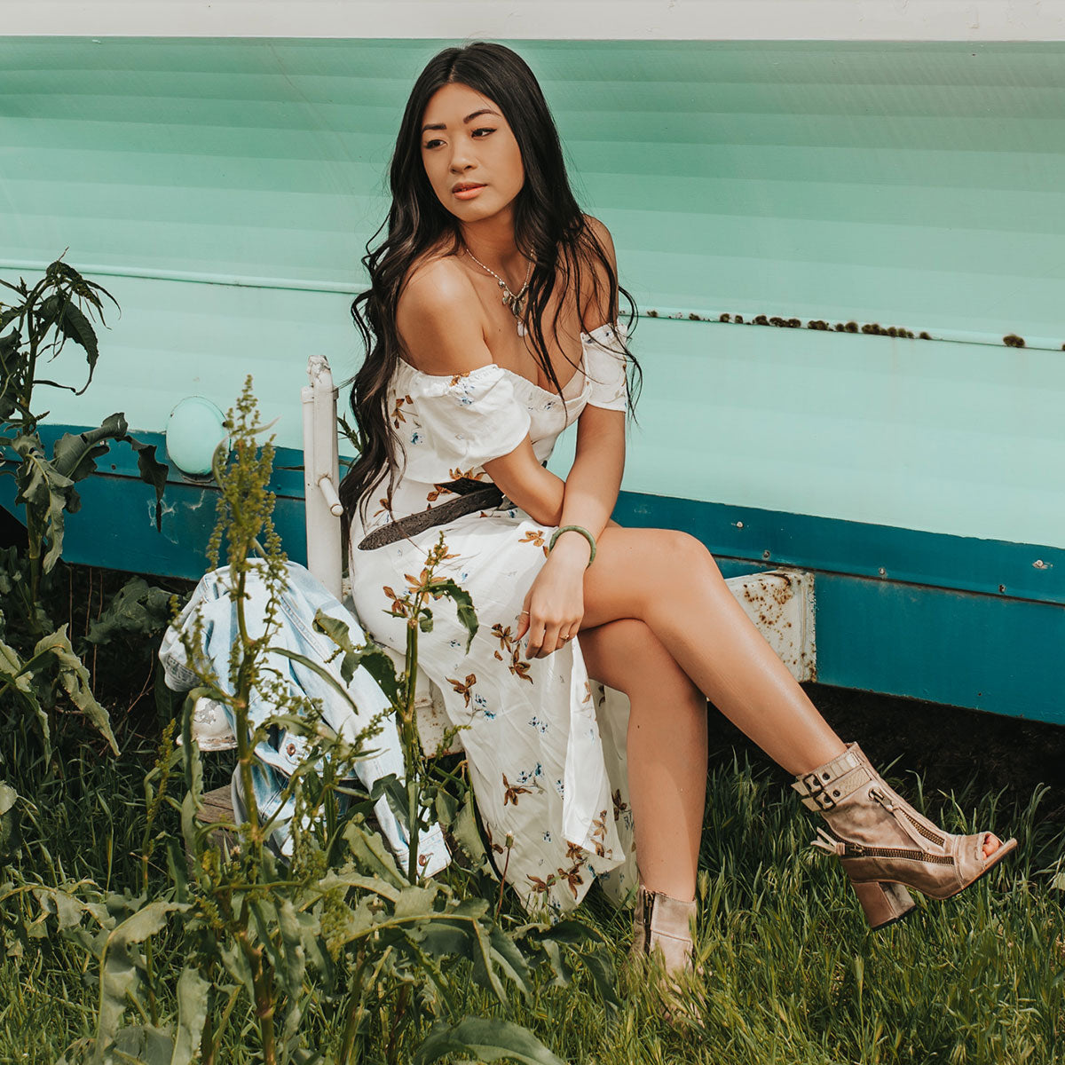 FREEBIRD women's Zombi taupe sandal with zip and buckle leather detailing and stacked heel lifestyle image