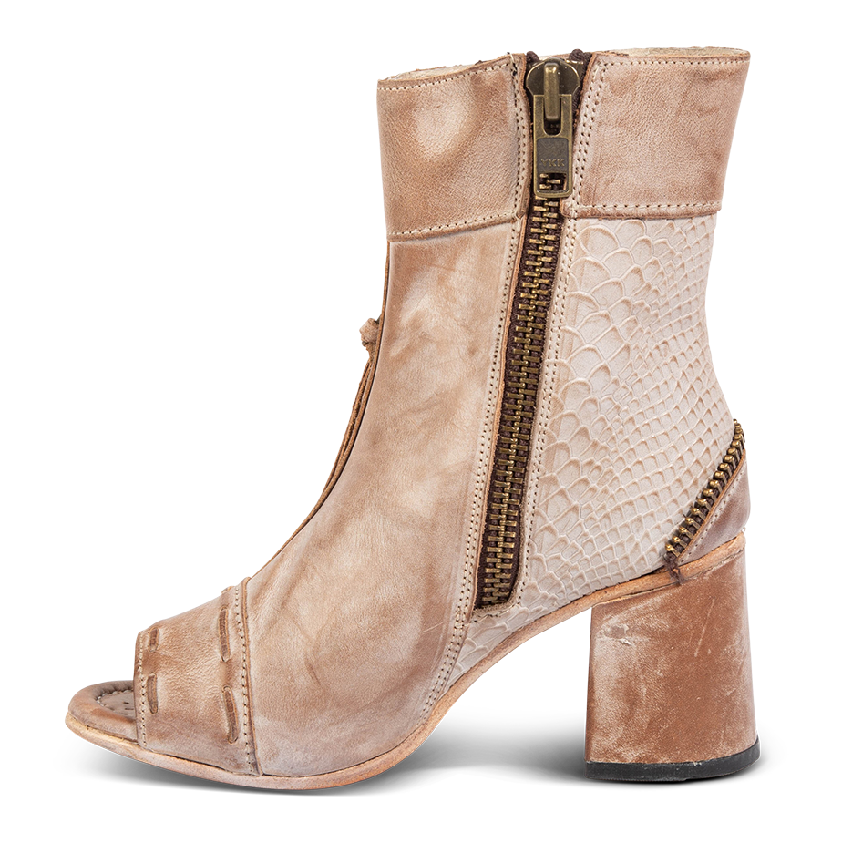 Inside view showing working brass zip closure and stacked heel on FREEBIRD women's Zombi taupe sandal 