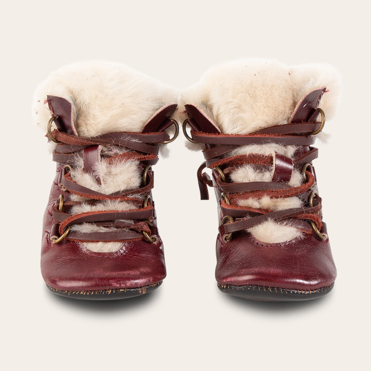 FREEBIRD infant baby Norway wine shearling lined leather bootie with front lacing lifestyle image