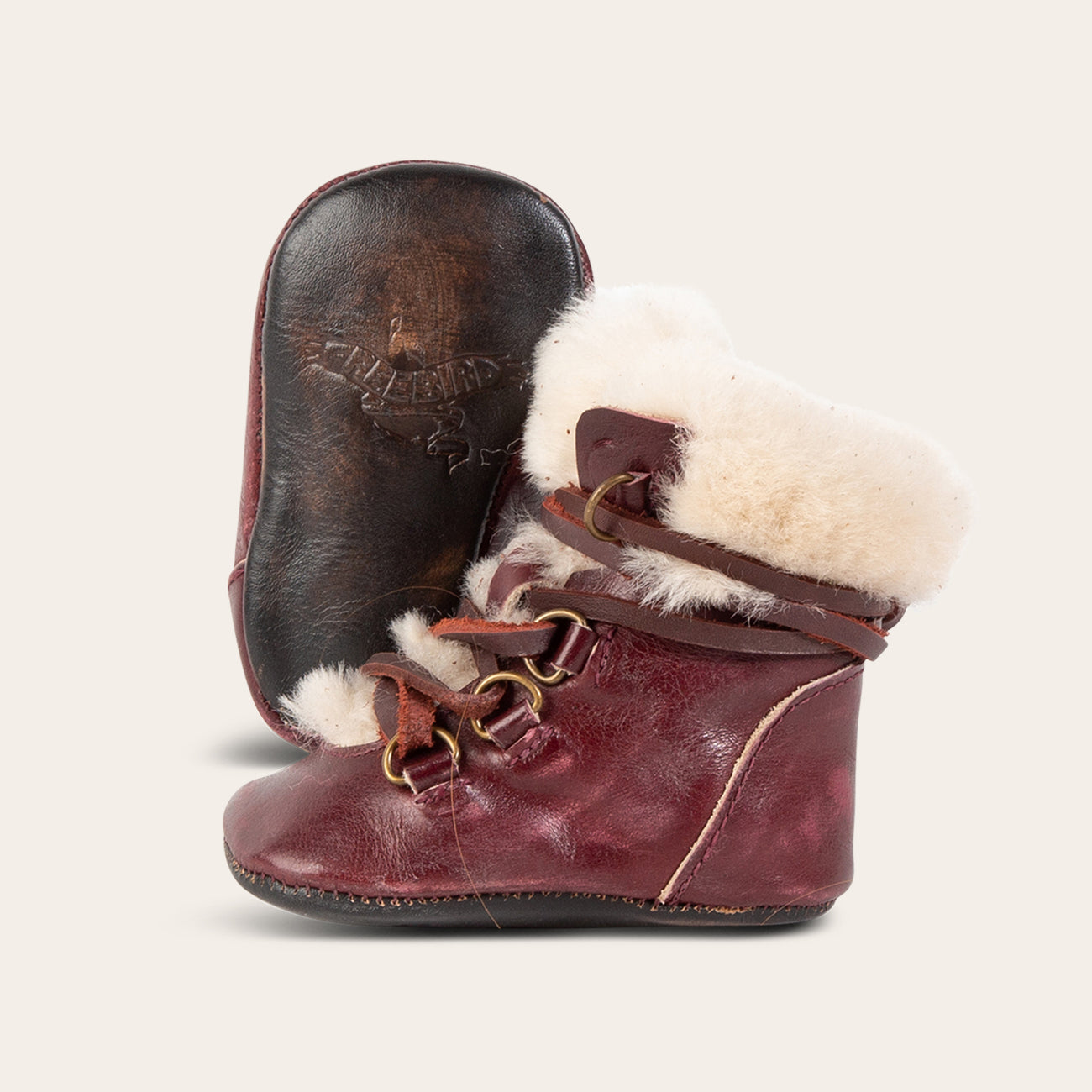 FREEBIRD infant baby Norway wine shearling lined leather bootie with front lacing lifestyle image