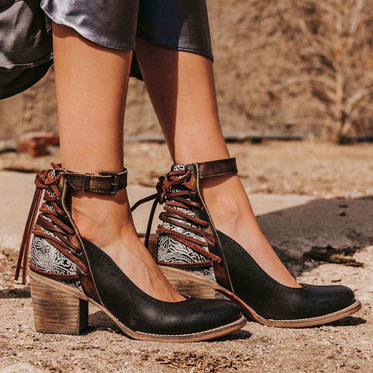 FREEBIRD women's Raeanne black multi embossed leather heeled shoe with back leather lacing and ankle strap