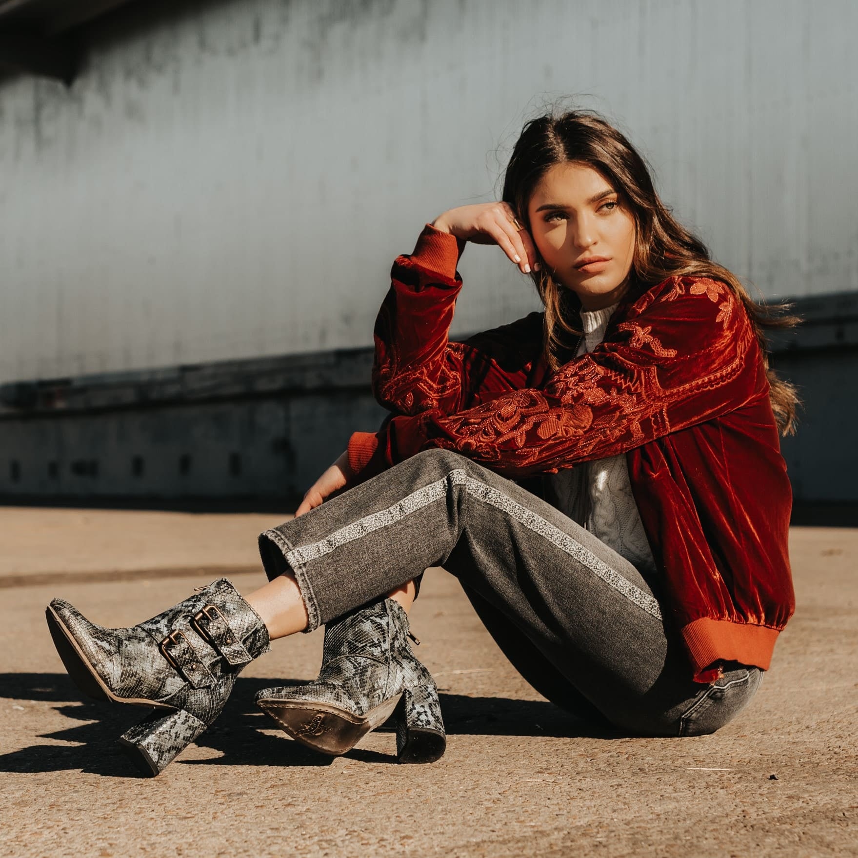 FREEBIRD women's Joey blue multi embossed leather bootie with flare heel and brass buckles lifestyle