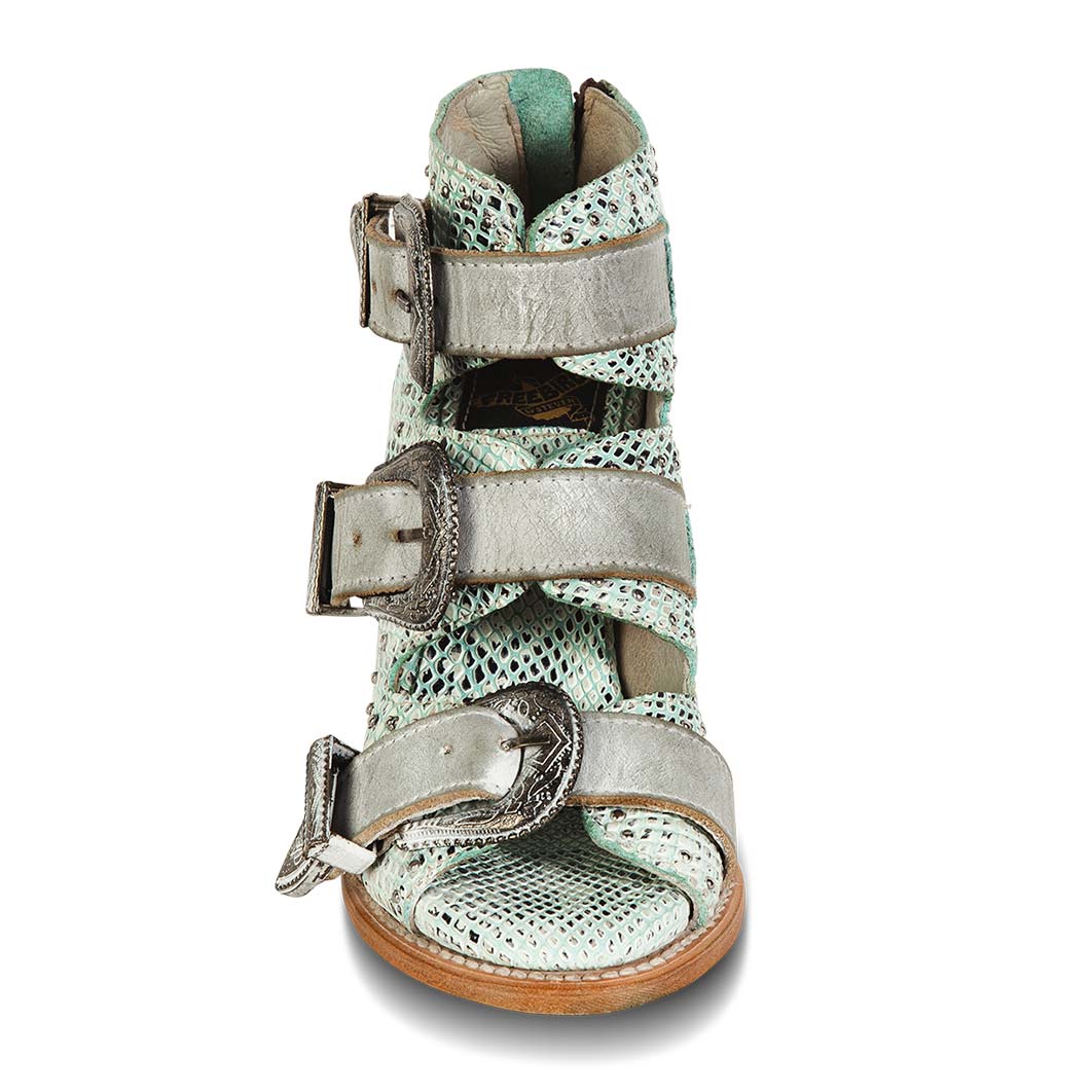 Front view showing open toe construction with adjustable studded leather straps on FREEBIRD women's Violet turquoise snake sandal