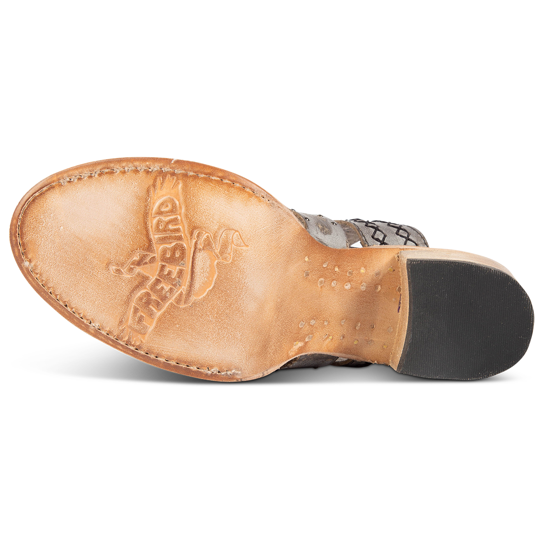Leather sole imprinted with FREEBIRD on women's Albuquerque ice open-toe slip-on sandal