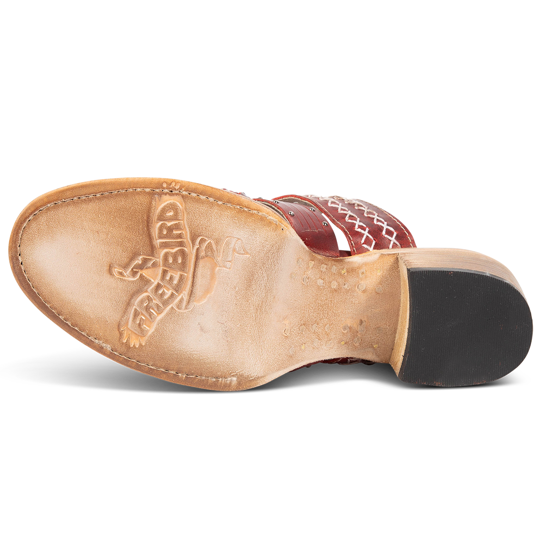 Leather sole imprinted with FREEBIRD on women's Albuquerque red open-toe slip-on sandal