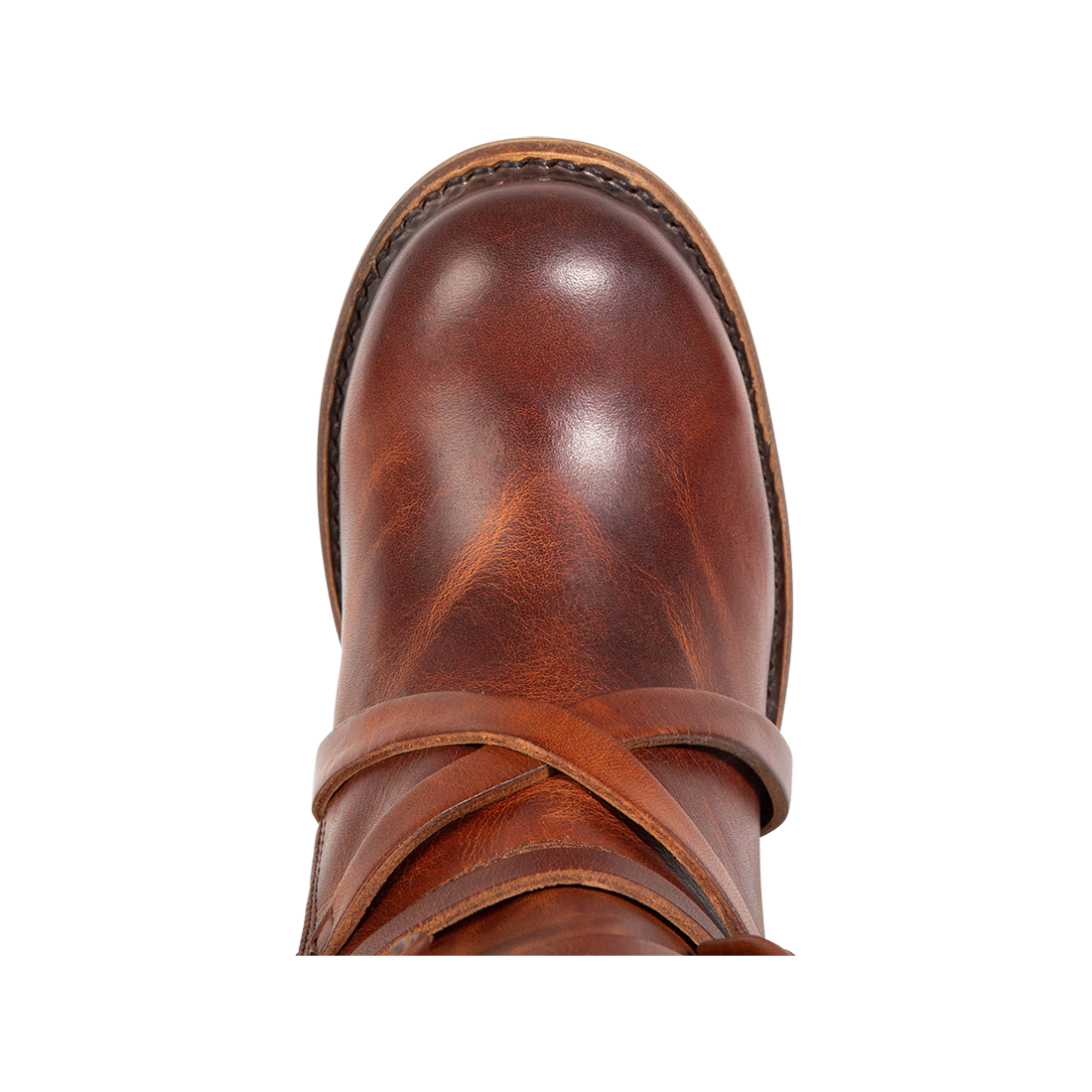 Top view showing round toe and leather ankle straps on FREEBIRD women's Baker cognac boot
