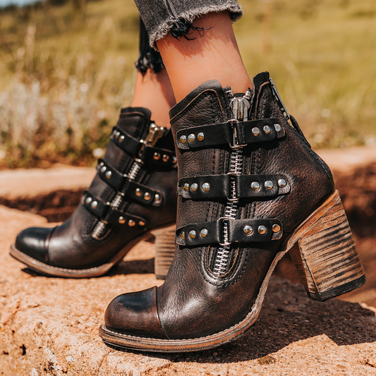 FREEBIRD women's Beckett black full grain leather bootie with inside zip closure, stacked heel, and embellished leather overlays
