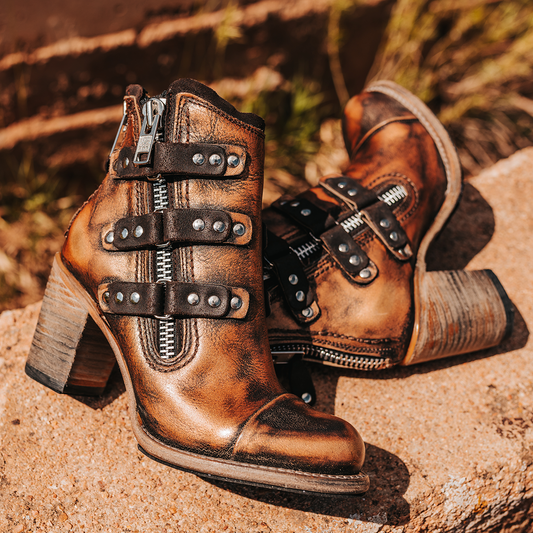 FREEBIRD women's Beckett bronze full grain leather bootie with inside zip closure, stacked heel, and embellished leather overlays