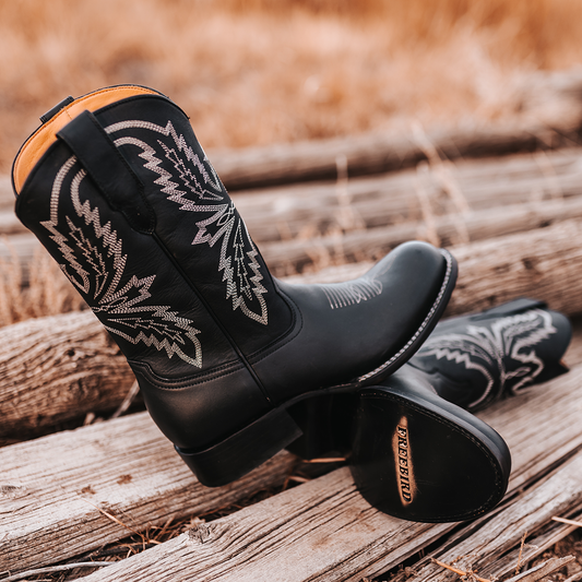 FREEBIRD men's Bison Black featuring a round toe, unique shaft stitch detailing, pull straps, and a traditional toe stitch