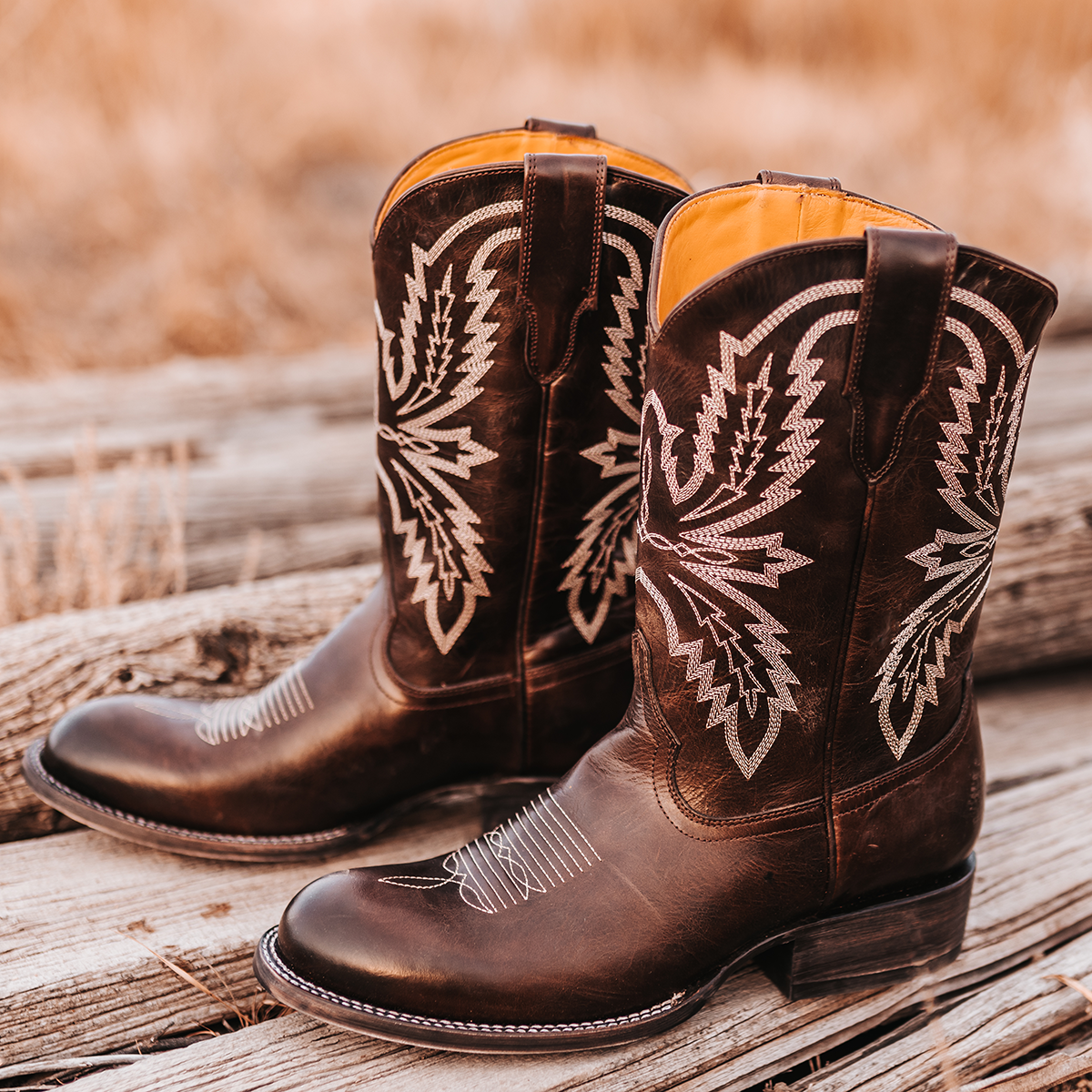 FREEBIRD men's Bison brown featuring a round toe, unique shaft stitch detailing, pull straps, and a traditional toe stitch