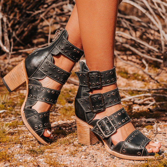 FREEBIRD women's Blake black sandal with thick straps, metal eyelets and high-heel