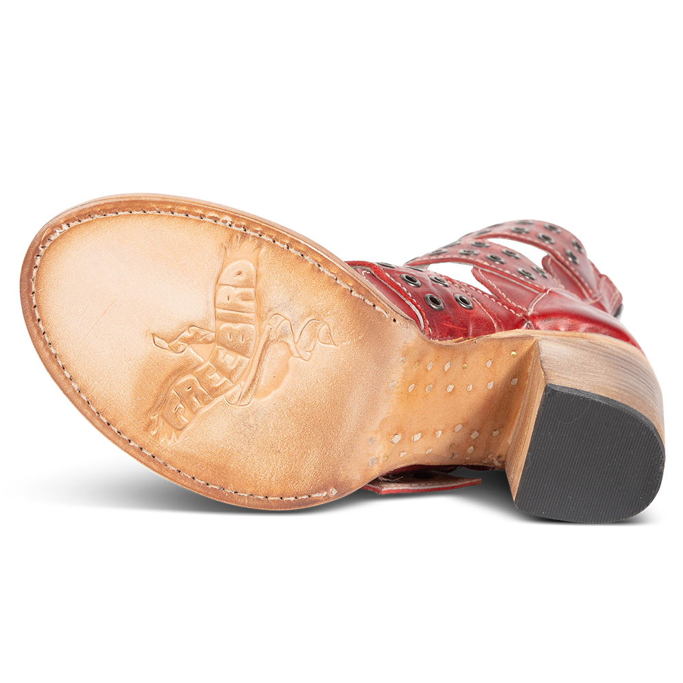 Leather sole imprinted with FREEBIRD on women's Blake red sandal