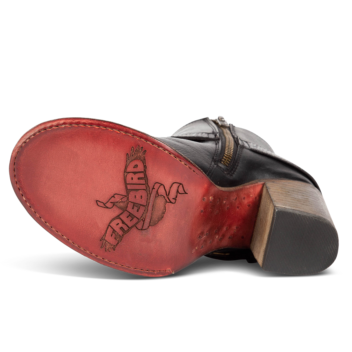 Red leather sole imprinted with FREEBIRD on women's Bolo black ankle bootie